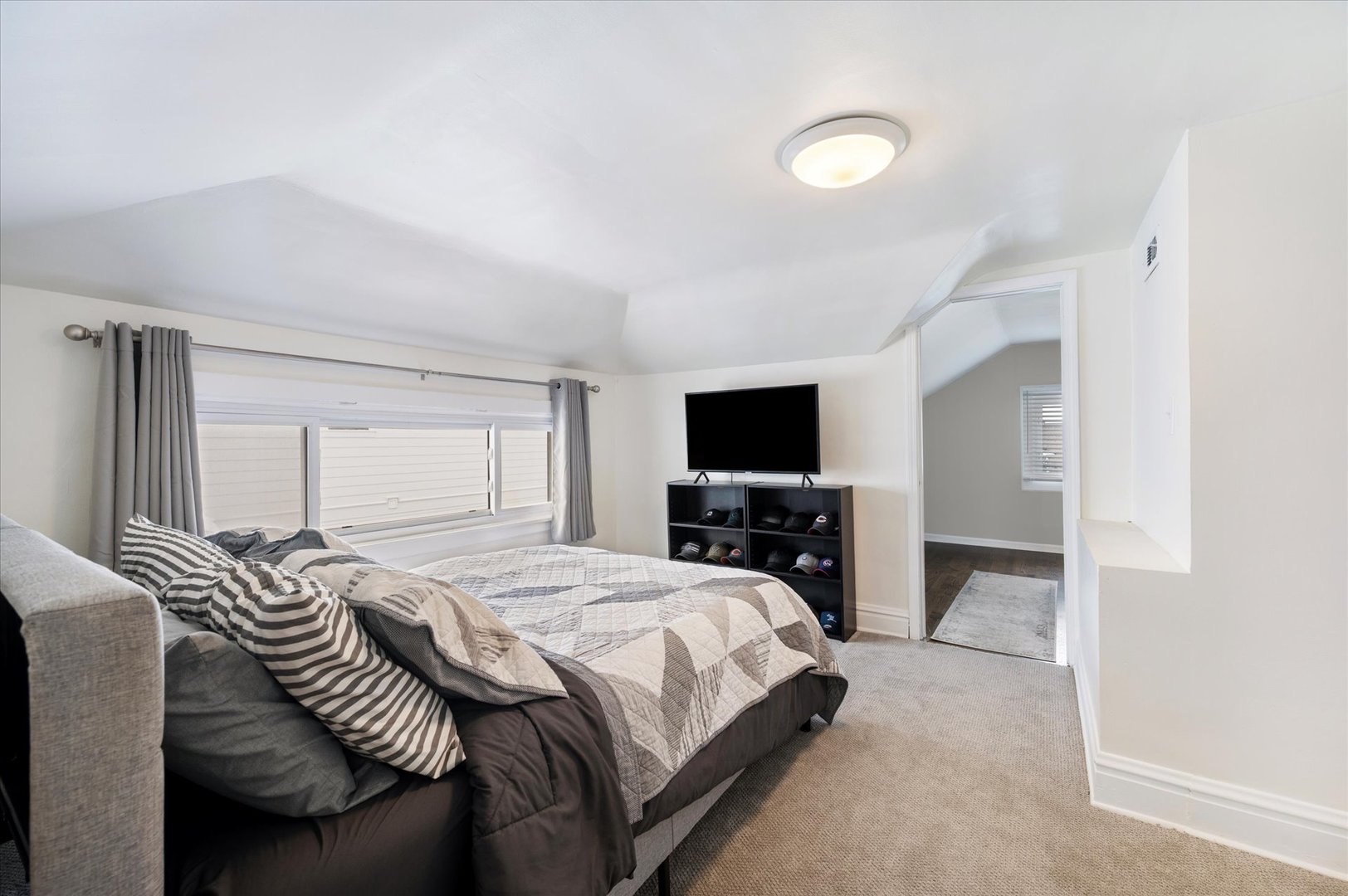 272 North Willow Road Elmhurst, IL 60126 - Photo 23 of 38 a bedroom with a bed and a flat screen tv