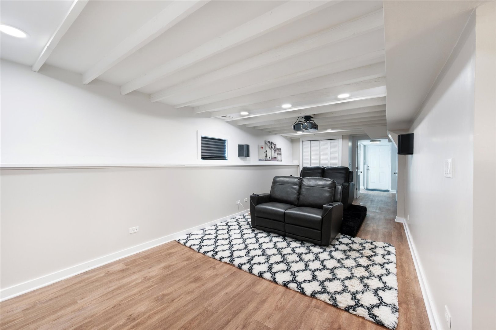 272 North Willow Road Elmhurst, IL 60126 - Photo 27 of 38 a living room with a couch and a window with wooden floor