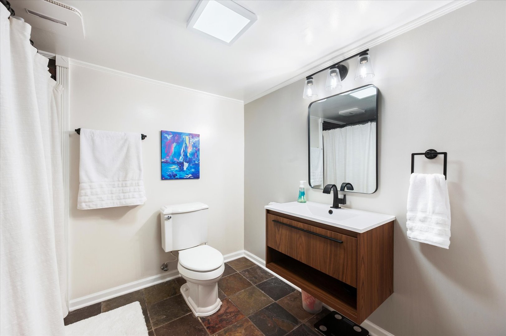 272 North Willow Road Elmhurst, IL 60126 - Photo 30 of 38 a bathroom with a toilet sink and mirror