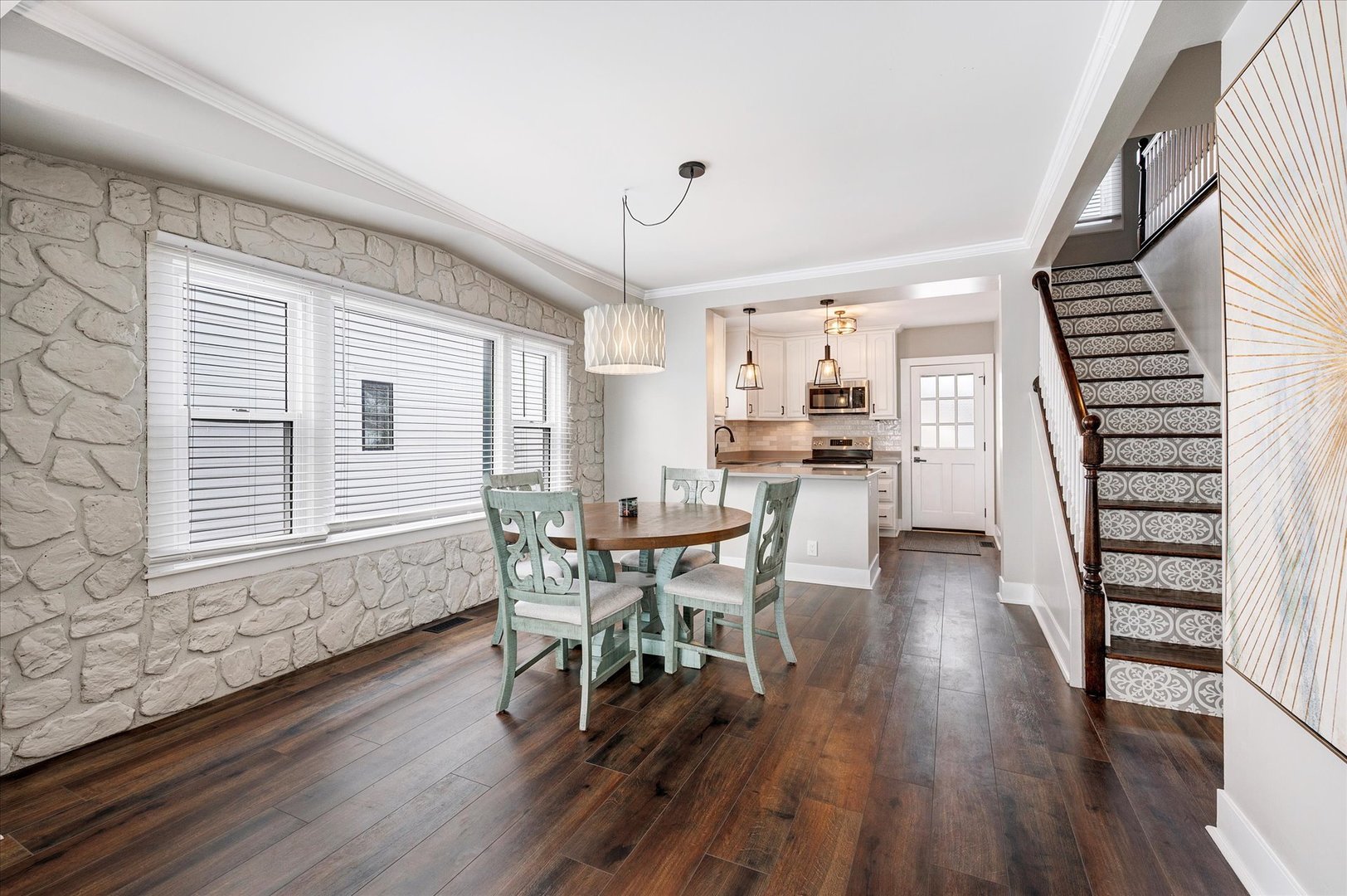 272 North Willow Road Elmhurst, IL 60126 - Photo 8 of 38 a dining room with furniture entryway and wooden floor