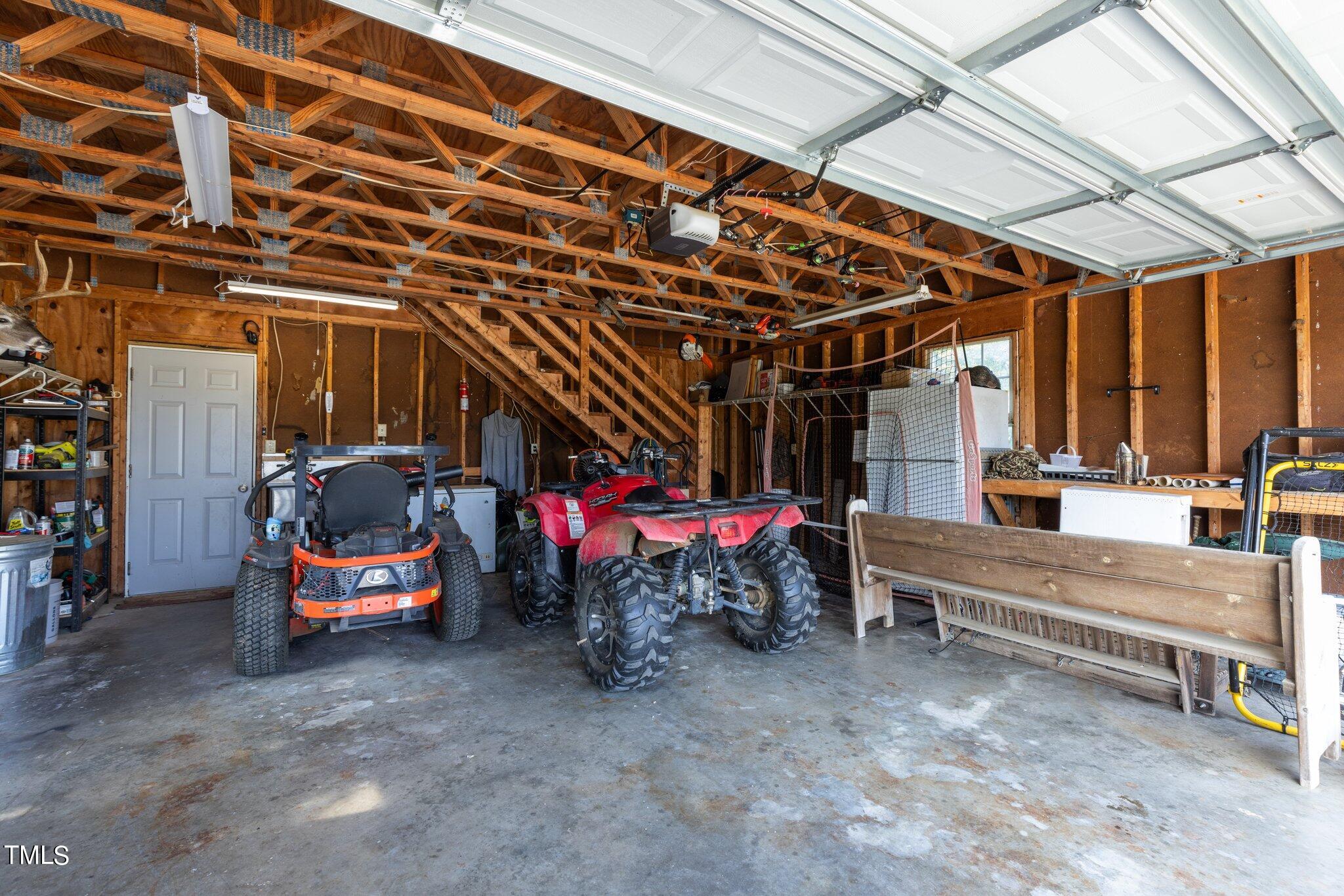 5321 Holland Church Road Raleigh, NC 27603 - Photo 39 of 43 a view of a room with gym equipment