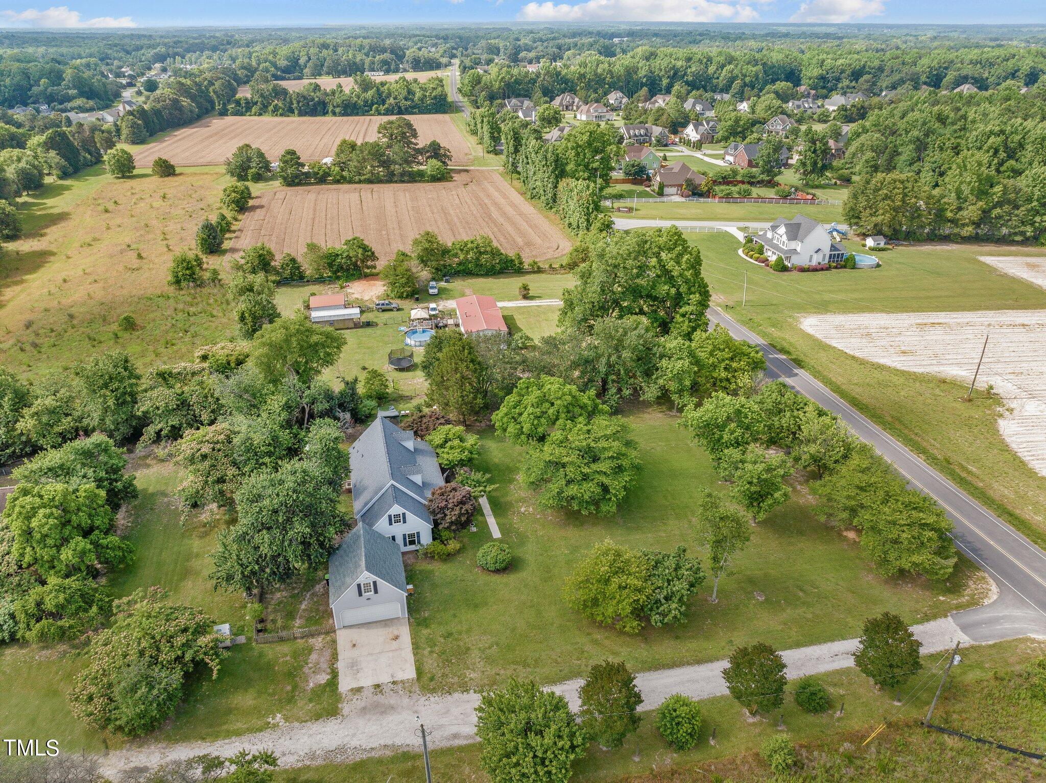 5321 Holland Church Road Raleigh, NC 27603 - Photo 43 of 43 an aerial view of residential houses with outdoor space and river view