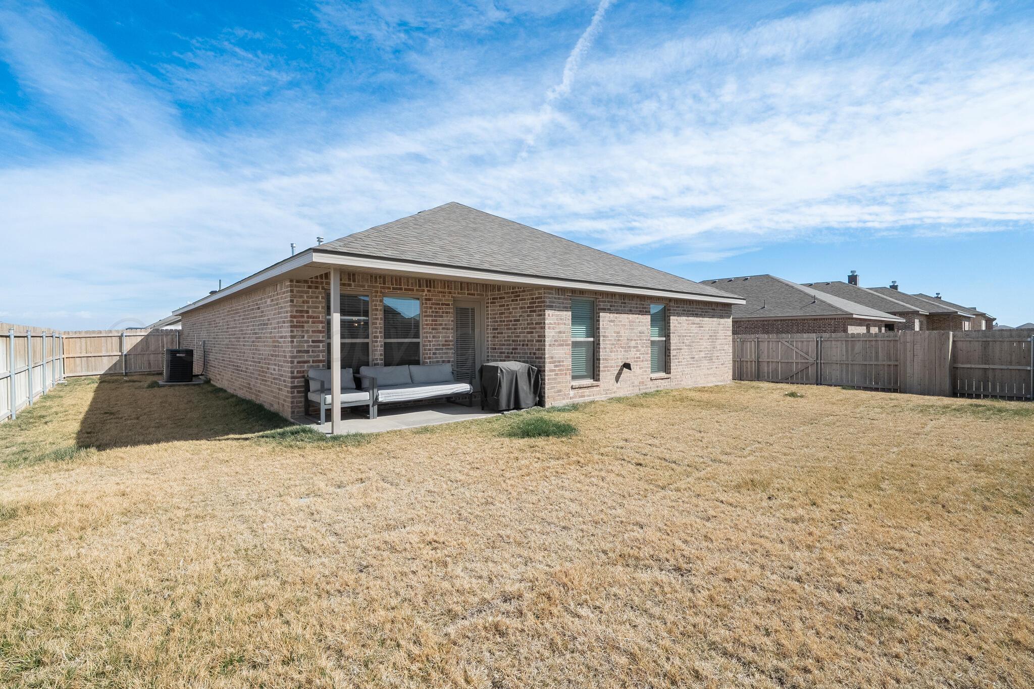 7500 Castleman Road Amarillo, TX 79119 - Photo 20 of 20 a house with trees in the background