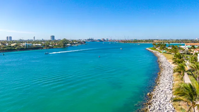 a view of a room with a large window and tub