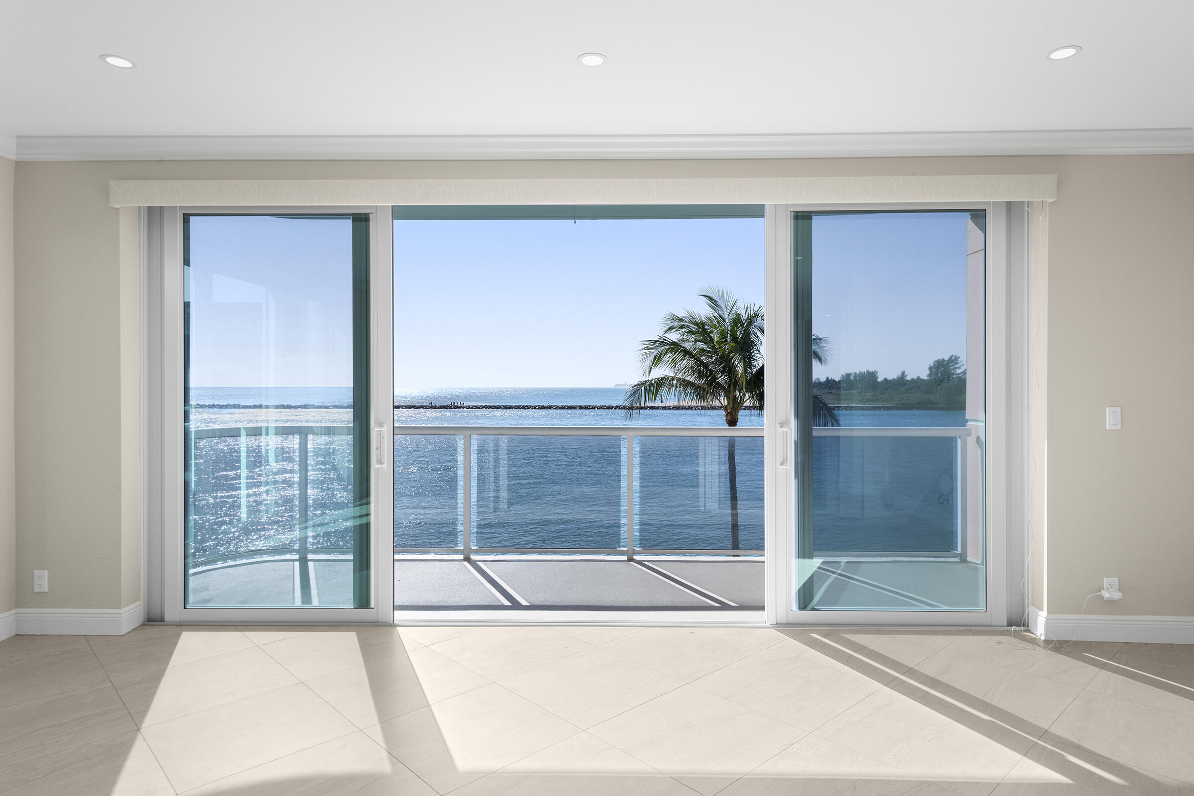 140 Inlet Way, Unit 312 Palm Beach Shores, FL 33404 - Photo 12 of 59 a view of a room with a large window and tub