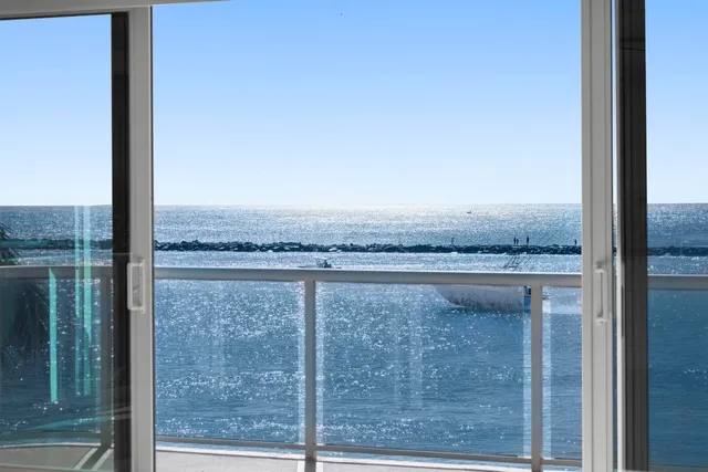 a kitchen with stainless steel appliances a refrigerator sink and cabinets