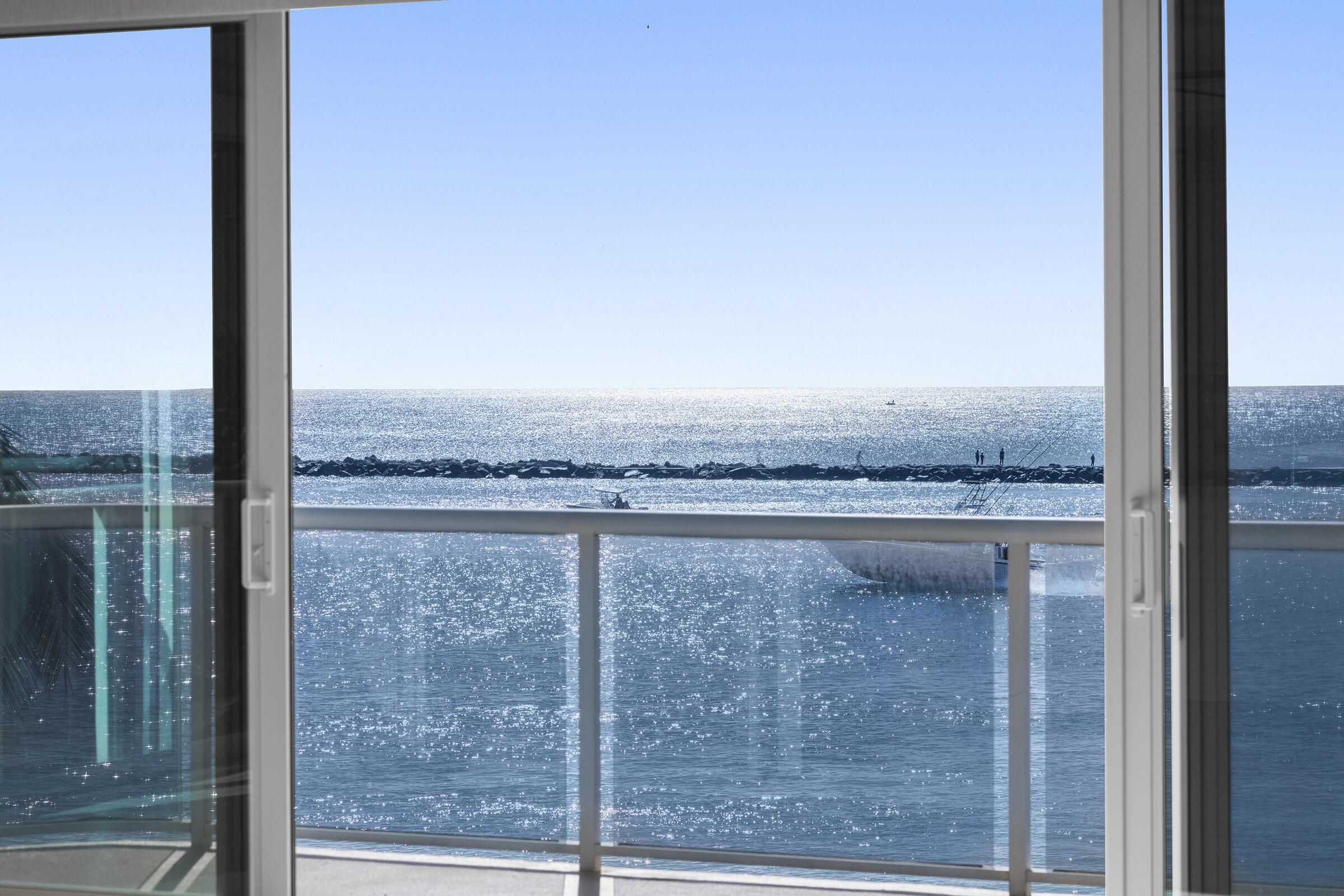 140 Inlet Way, Unit 312 Palm Beach Shores, FL 33404 - Photo 22 of 59 a view of a glass door