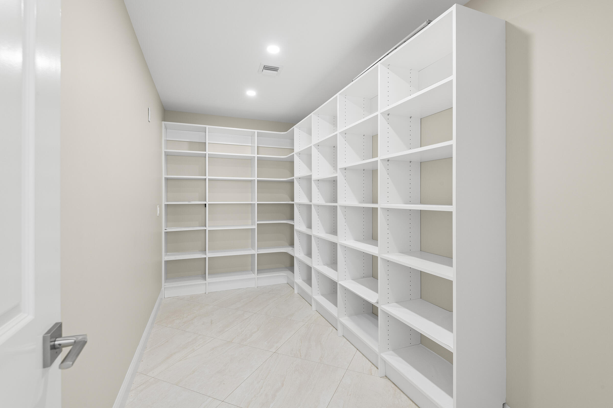 140 Inlet Way, Unit 312 Palm Beach Shores, FL 33404 - Photo 27 of 59 a view of an empty room with empty racks