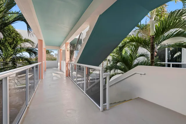 an aerial view of a house with outdoor space