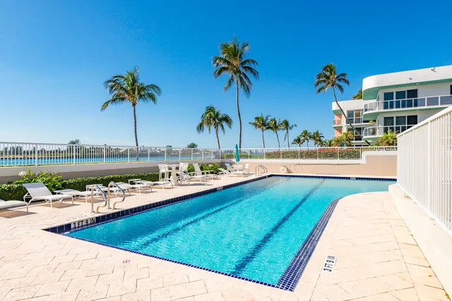 a view of multiple houses with a yard