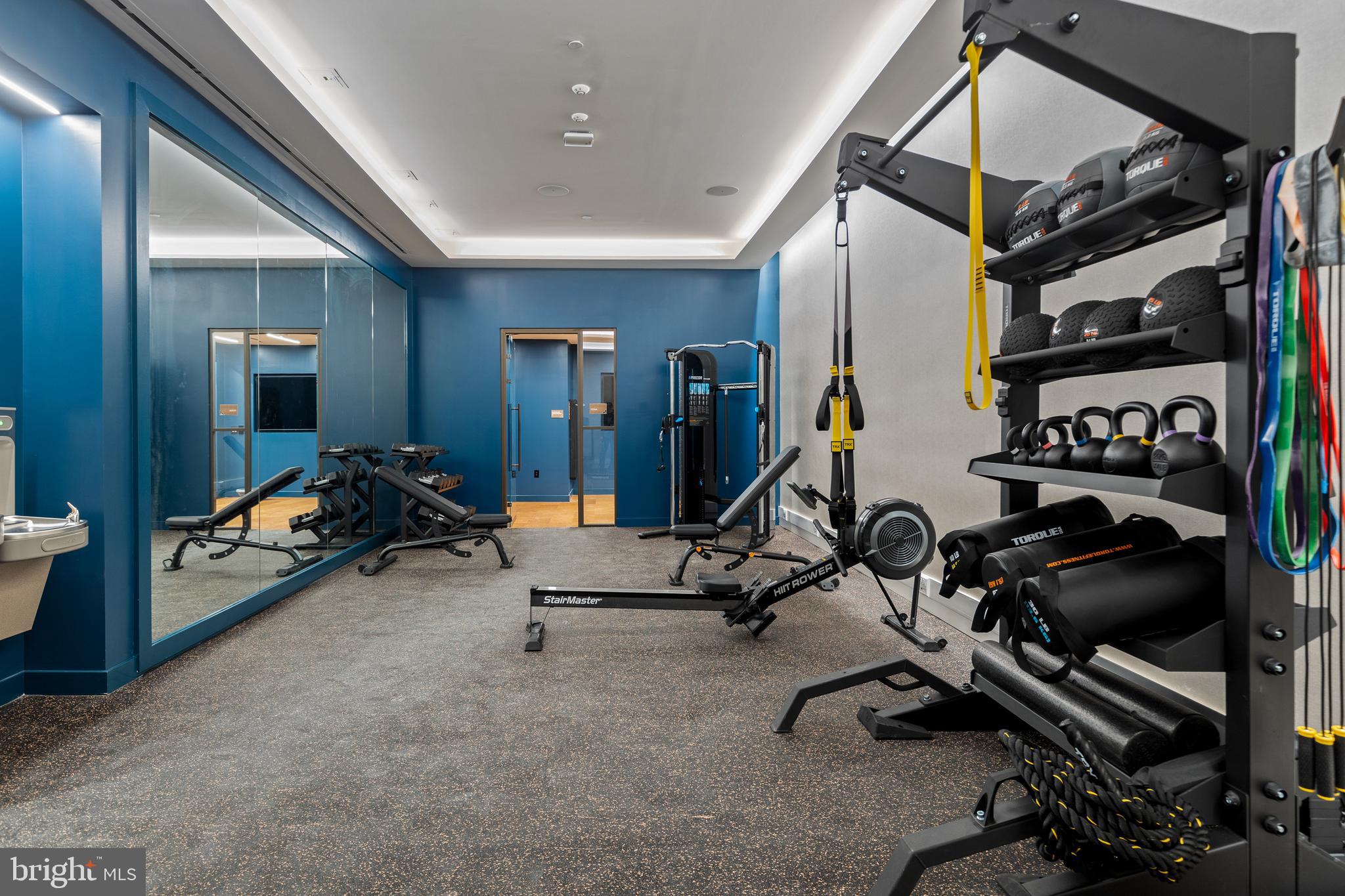 7175 12th Street Northwest, Unit 513 Washington, DC 20012 - Photo 25 of 31 a view of a room with gym equipment