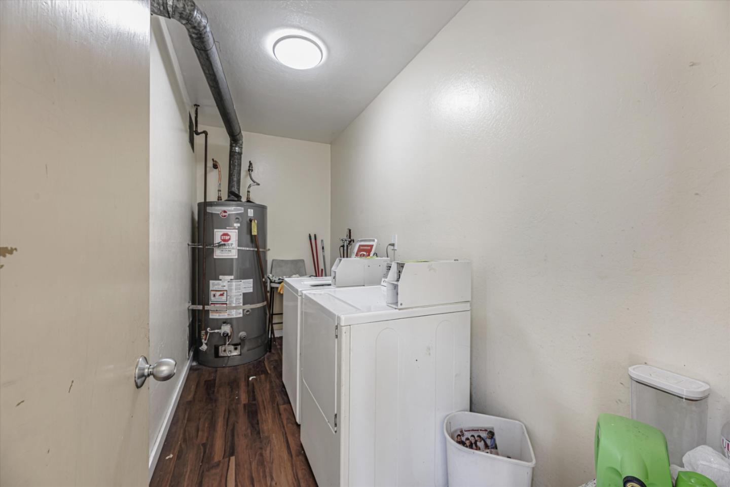 424 Richmond Drive Millbrae, CA 94030 - Photo 19 of 22 a storage room with a washer and dryer
