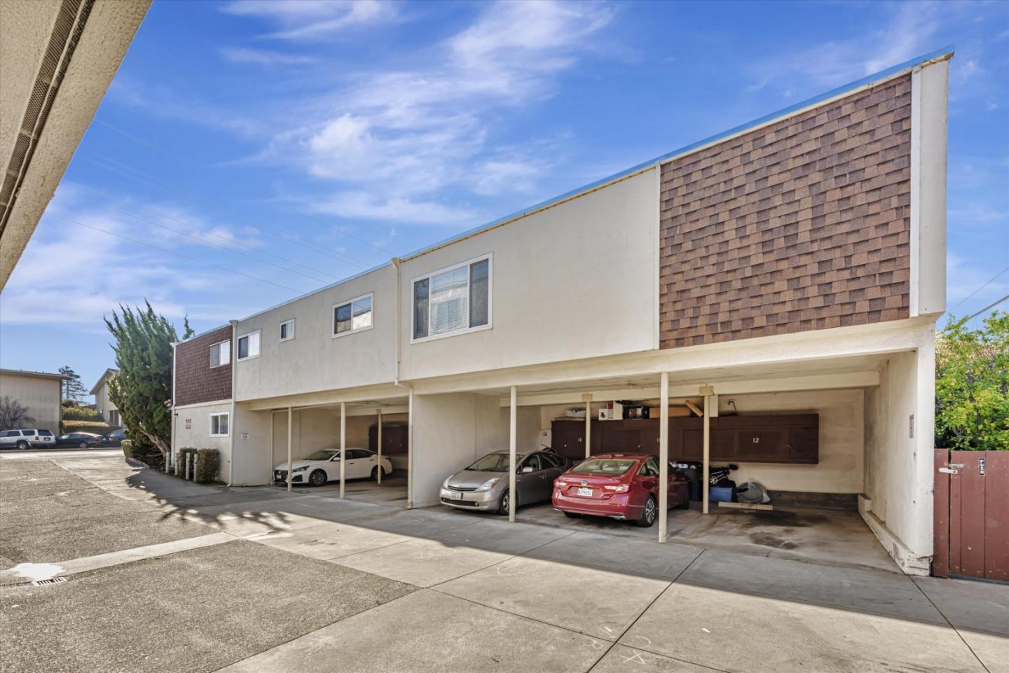 424 Richmond Drive Millbrae, CA 94030 - Photo 22 of 22 a view of a building with cars parked