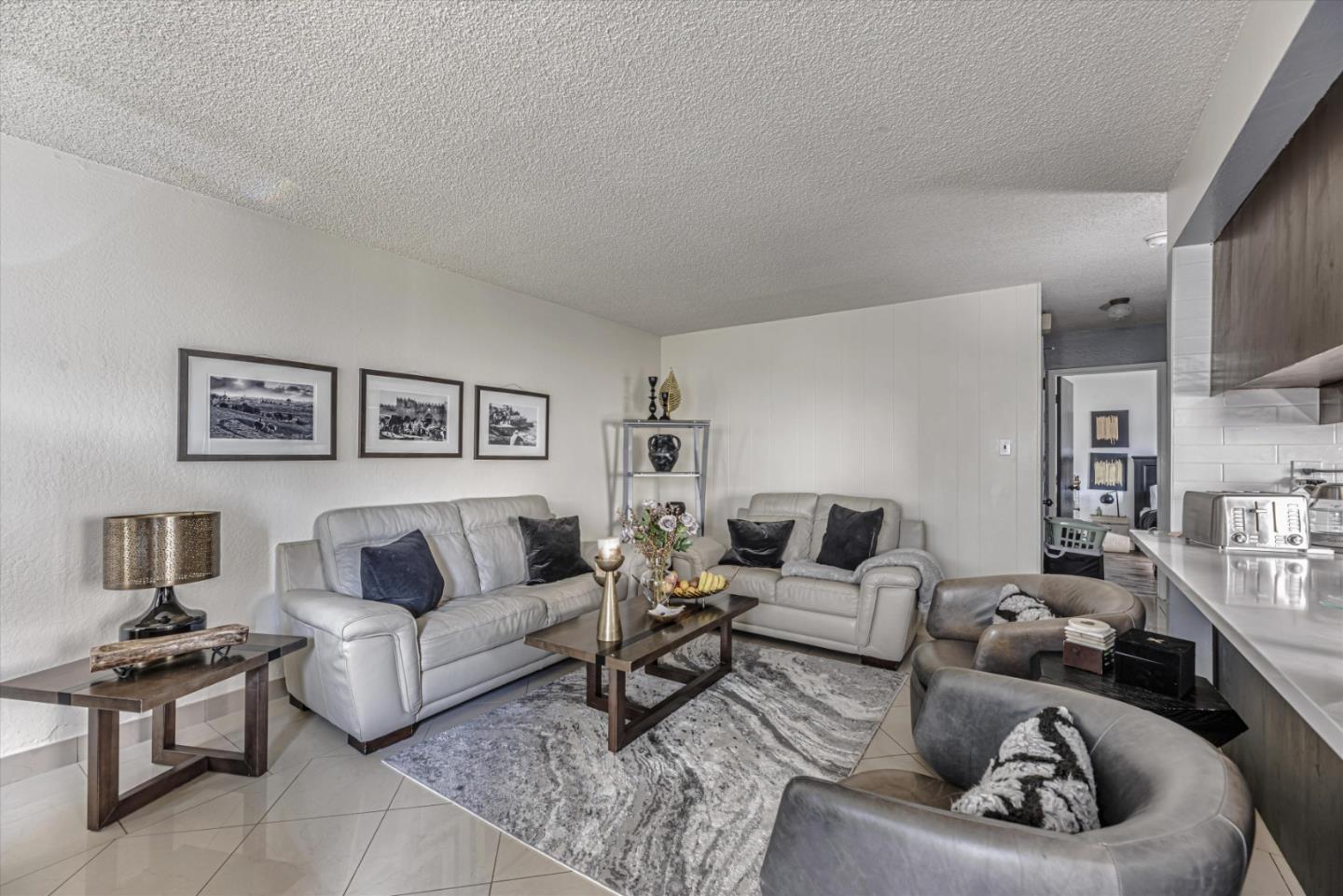 424 Richmond Drive Millbrae, CA 94030 - Photo 9 of 22 a living room with furniture and a couch