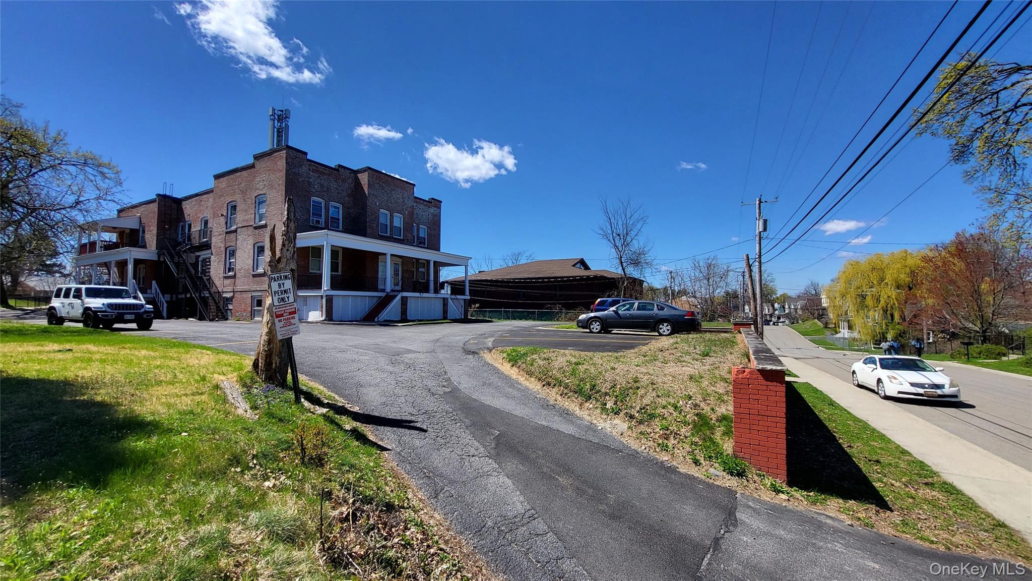 139 Rombout Avenue, Unit 1 Beacon, NY 12508 - Photo 1 of 1 a cars parked on the side of a street