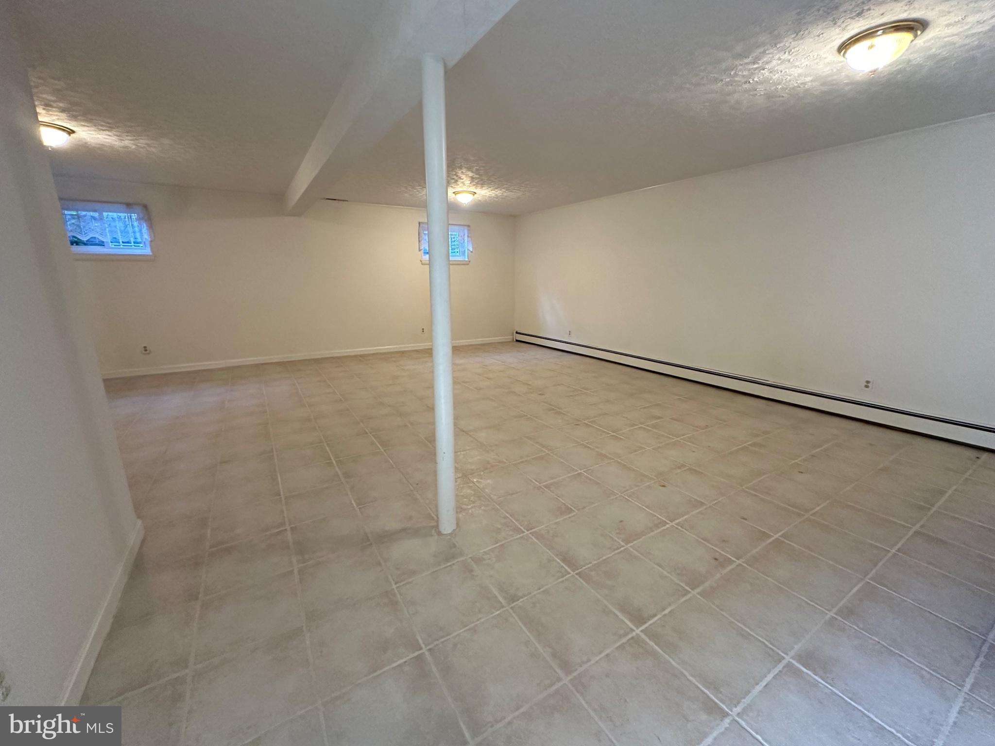 14616 Sturtevant Road Silver Spring, MD 20905 - Photo 26 of 44 Spacious, versatile basement retreat.