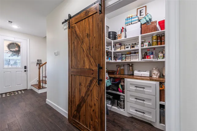 a room with storage and utility