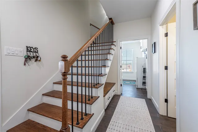 a view of entryway with wooden floor