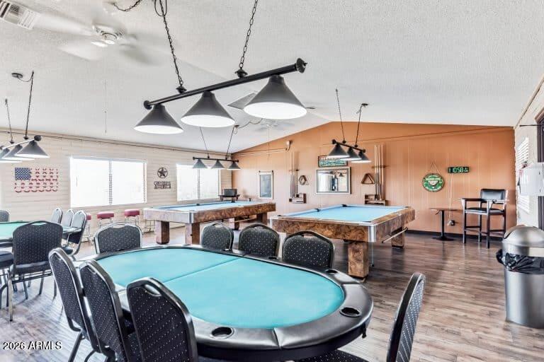 1101 South Ellsworth Road, Unit 153 Mesa, AZ 85208 - Photo 22 of 24 a view of a dining room with furniture window and wooden floor