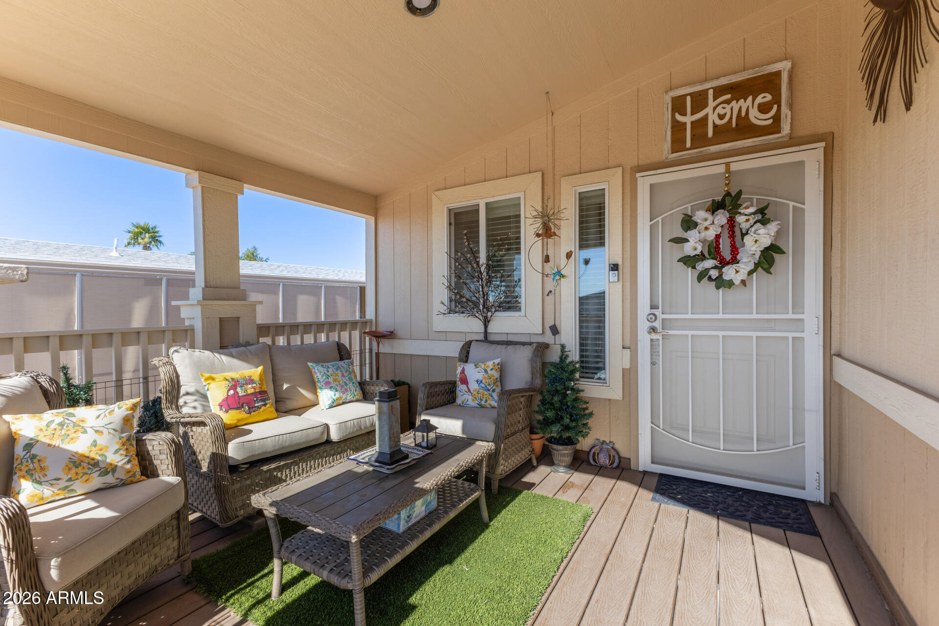 1101 South Ellsworth Road, Unit 153 Mesa, AZ 85208 - Photo 4 of 24 a living room with furniture and a potted plant