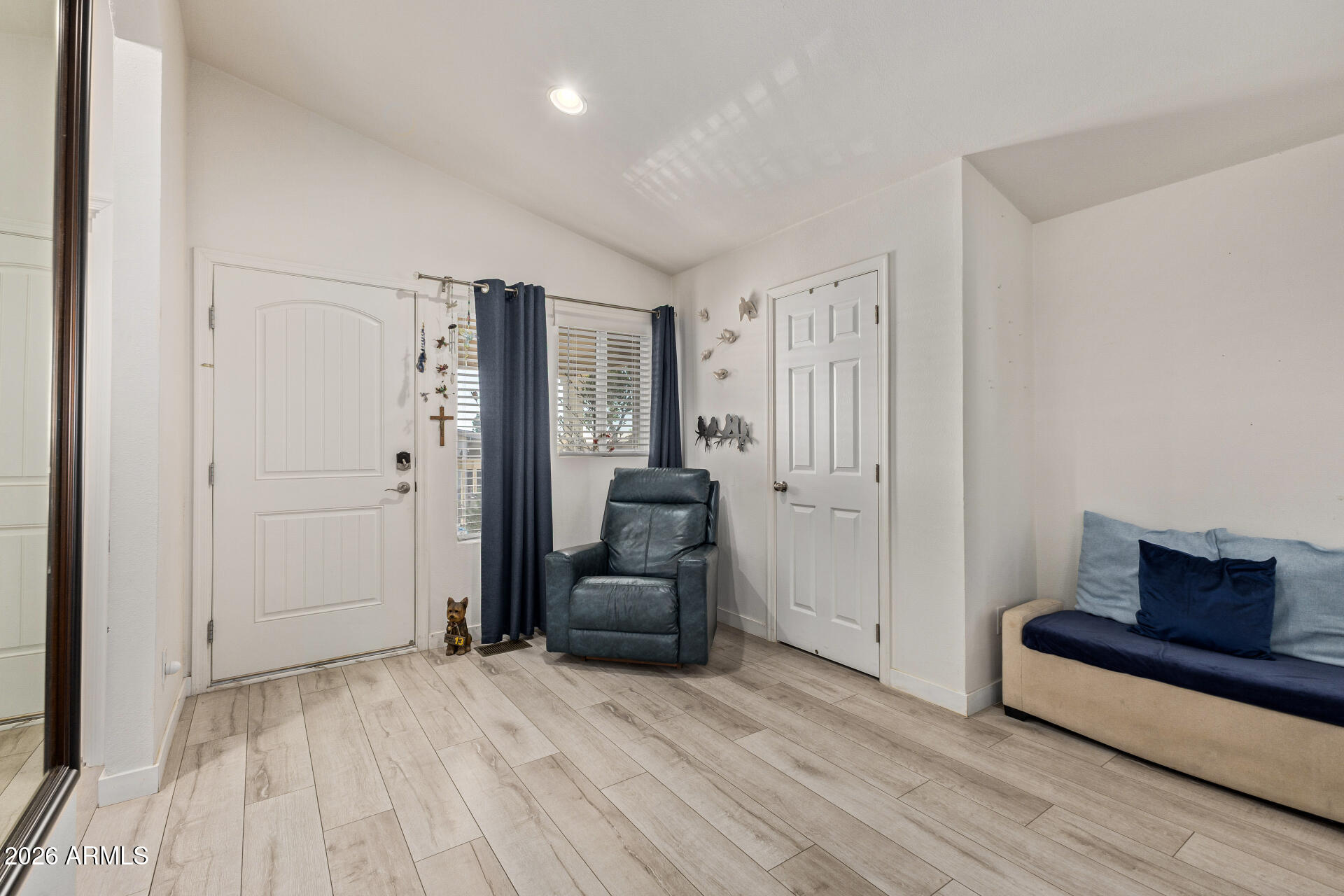 1101 South Ellsworth Road, Unit 153 Mesa, AZ 85208 - Photo 5 of 24 wooden floor and windows in a room