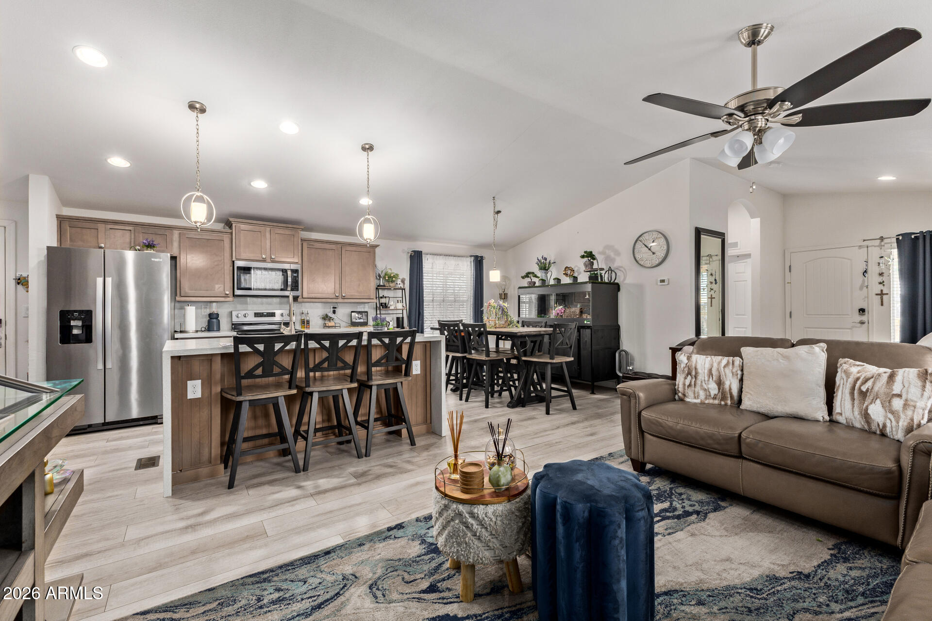 1101 South Ellsworth Road, Unit 153 Mesa, AZ 85208 - Photo 6 of 24 a living room kitchen with furniture and a view of kitchen