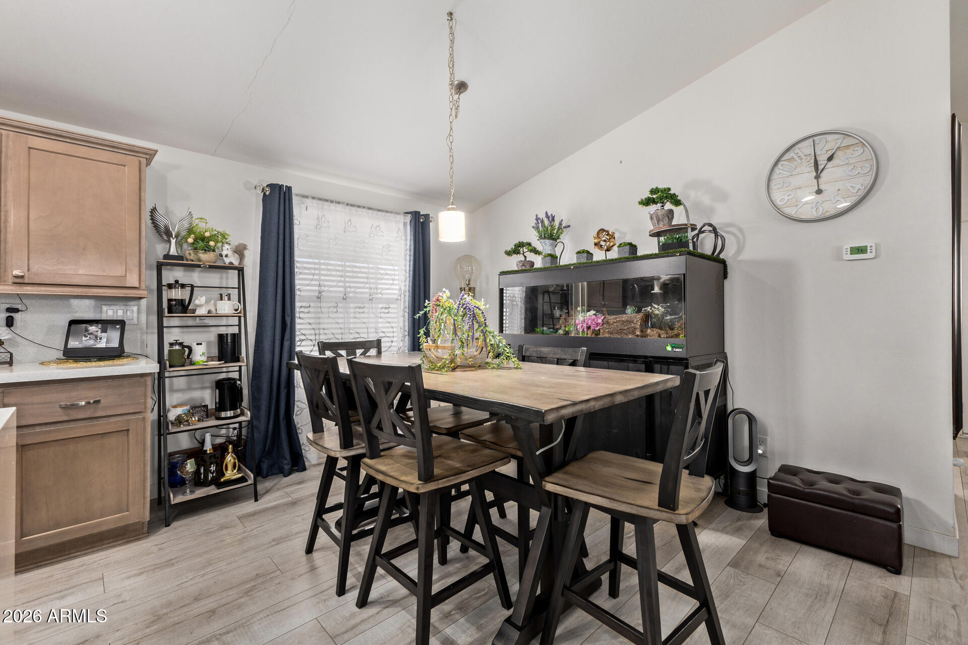1101 South Ellsworth Road, Unit 153 Mesa, AZ 85208 - Photo 8 of 24 a dining room with furniture and window