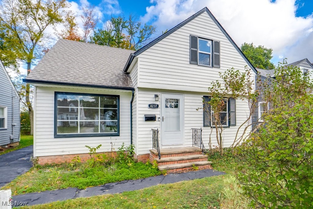 4237 Verona Road Cleveland, OH 44121 - Photo 1 of 41 View of front of house featuring a shingled roof