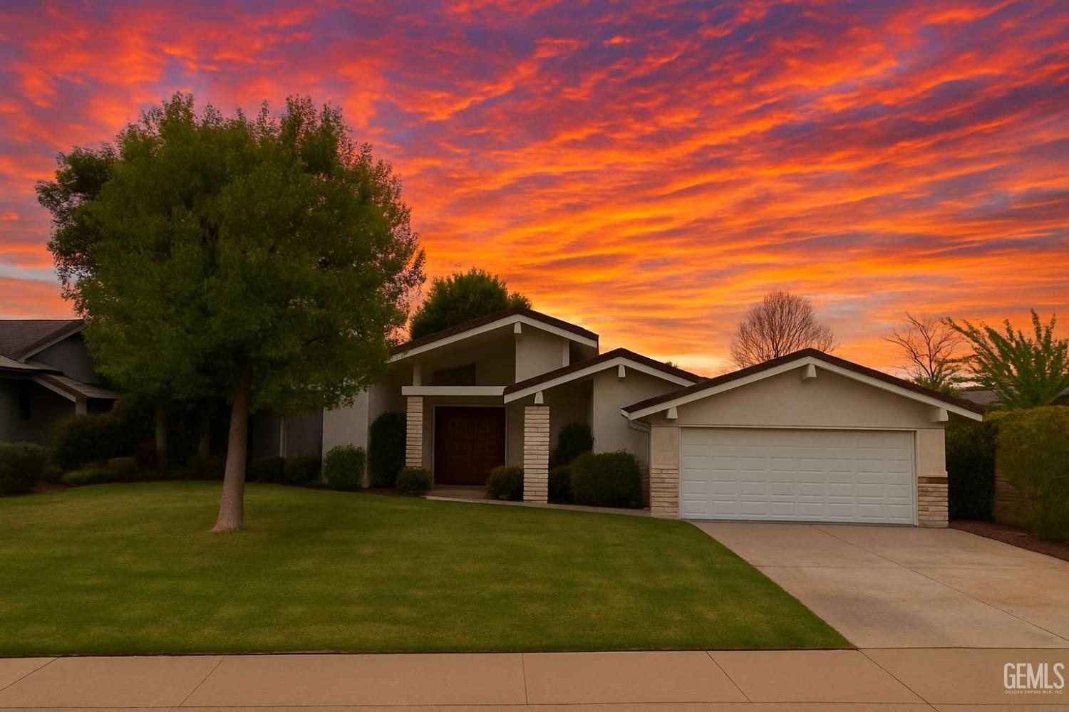 Undisclosed Address Bakersfield, CA 93306 - Photo 1 of 3 a front view of house with a garden
