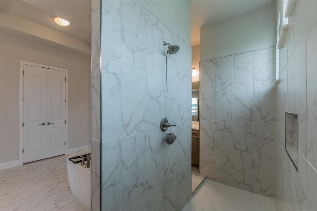 16833 Chapel Road Lorena, TX 76655 - Photo 15 of 40 a bathroom with a shower