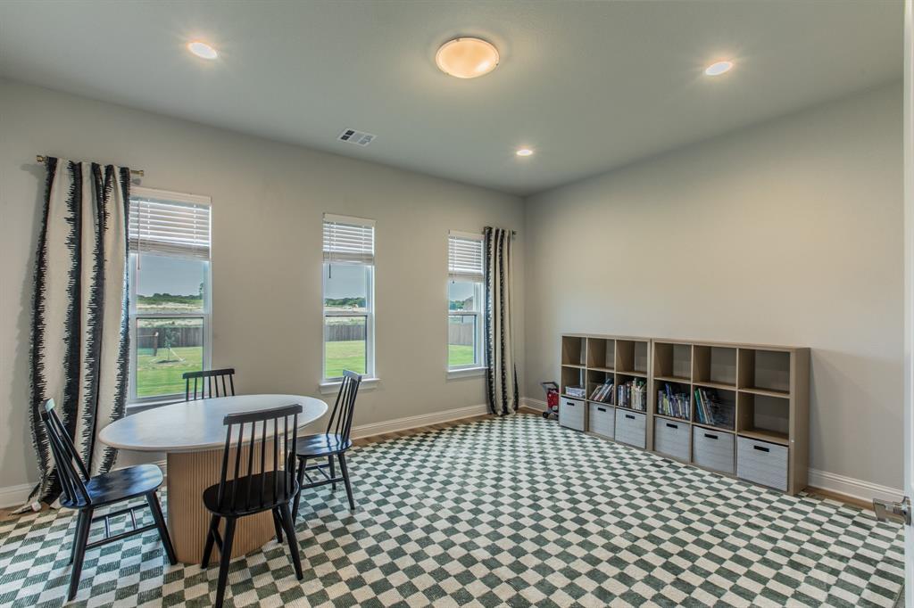 16833 Chapel Road Lorena, TX 76655 - Photo 16 of 40 a view of a dining room with furniture