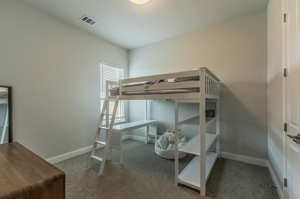 16833 Chapel Road Lorena, TX 76655 - Photo 19 of 40 a view of room with wooden floor and fan