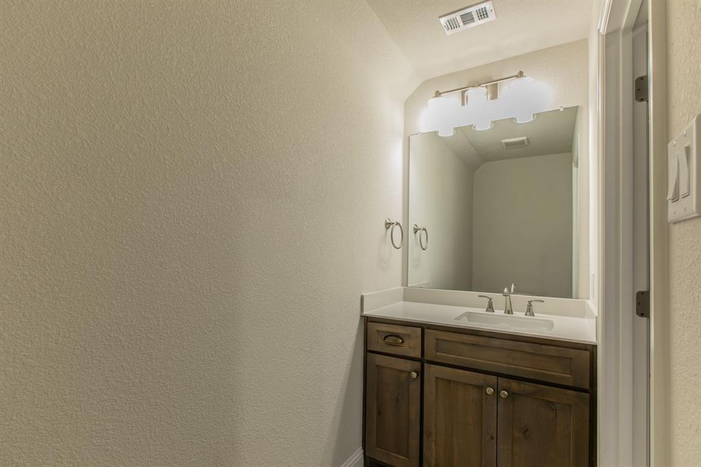 16833 Chapel Road Lorena, TX 76655 - Photo 22 of 40 a bathroom with a sink and mirror
