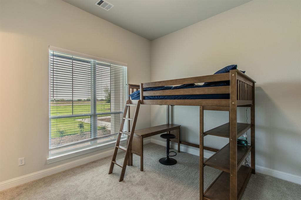 16833 Chapel Road Lorena, TX 76655 - Photo 23 of 40 a view of a room with gym equipment