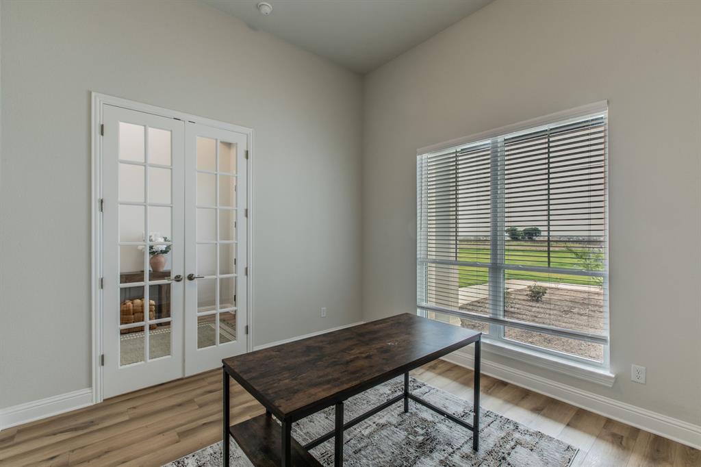 16833 Chapel Road Lorena, TX 76655 - Photo 30 of 40 a view of a room with wooden floor and windows