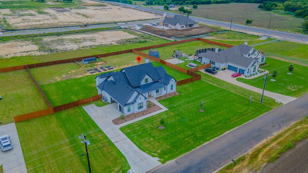 16833 Chapel Road Lorena, TX 76655 - Photo 37 of 40 swimming pool view with a garden