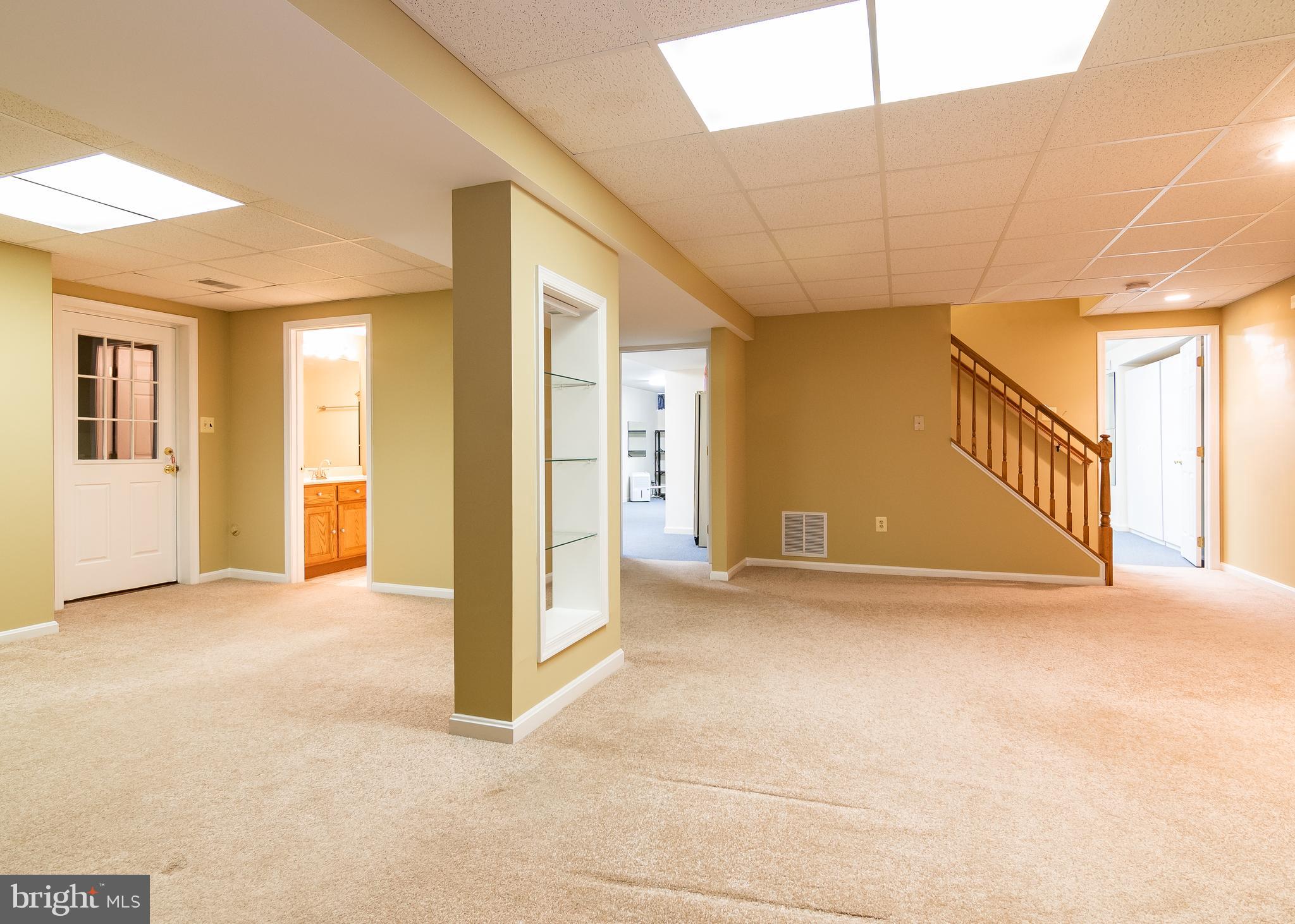 10464 Stansfield Road Laurel, MD 20723 - Photo 3 of 51 Huge lower level recreation room