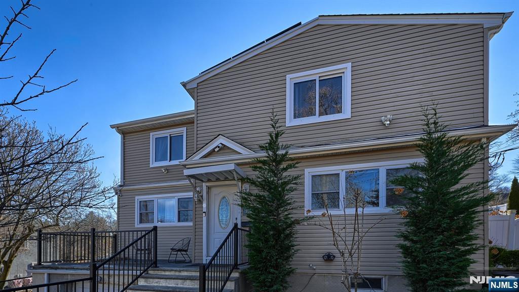 224 Pompton Road Haledon, NJ 07508 - Photo 3 of 34 a front view of a house with a yard