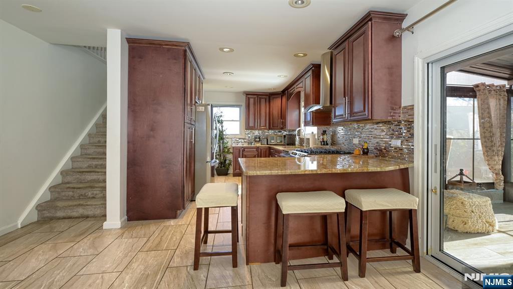 224 Pompton Road Haledon, NJ 07508 - Photo 9 of 34 a dining room with furniture and a window
