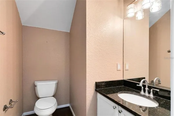 a bathroom with a sink and a toilet