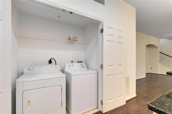 a utility room with dryer and washer