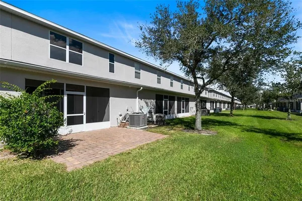 a front view of a house with garden and porch