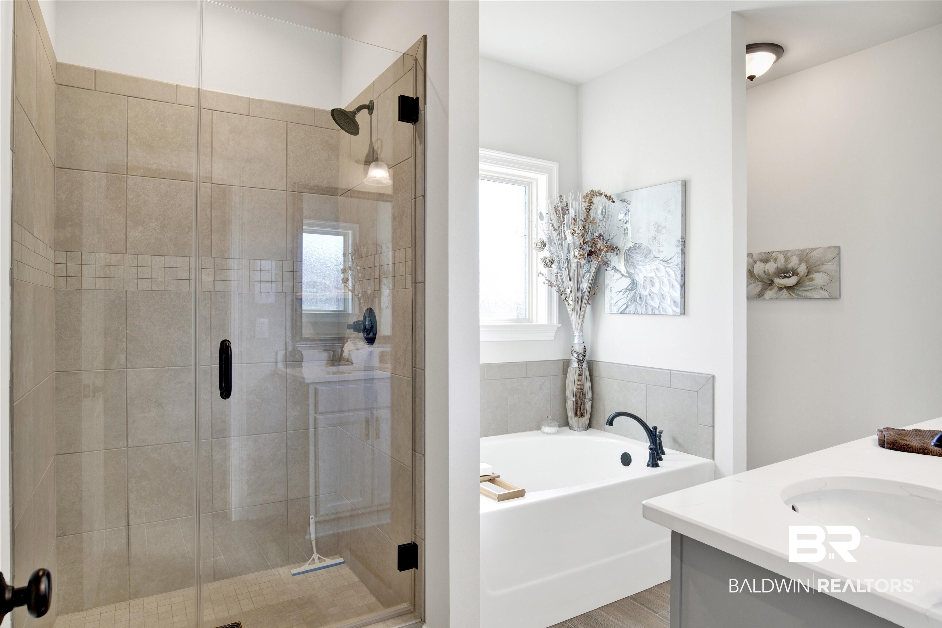 1406 Aldon Street Foley, AL 36535 - Photo 25 of 30 Bathroom featuring luxury wood-look tile flooring, vanity, and separate shower and tub.