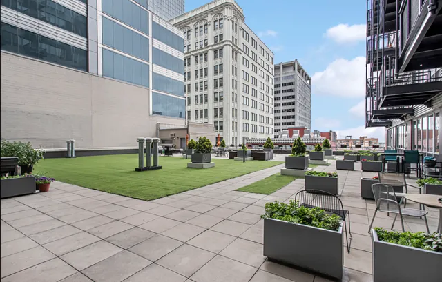 a view of a building and garden in the background