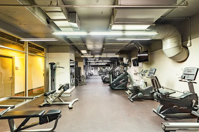 a view of a room with gym equipment