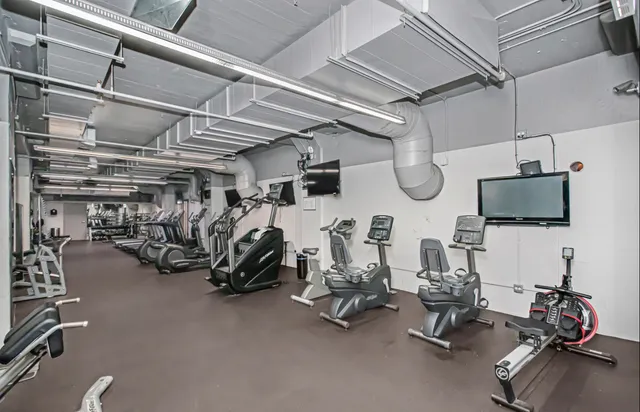 a view of a room with gym equipment