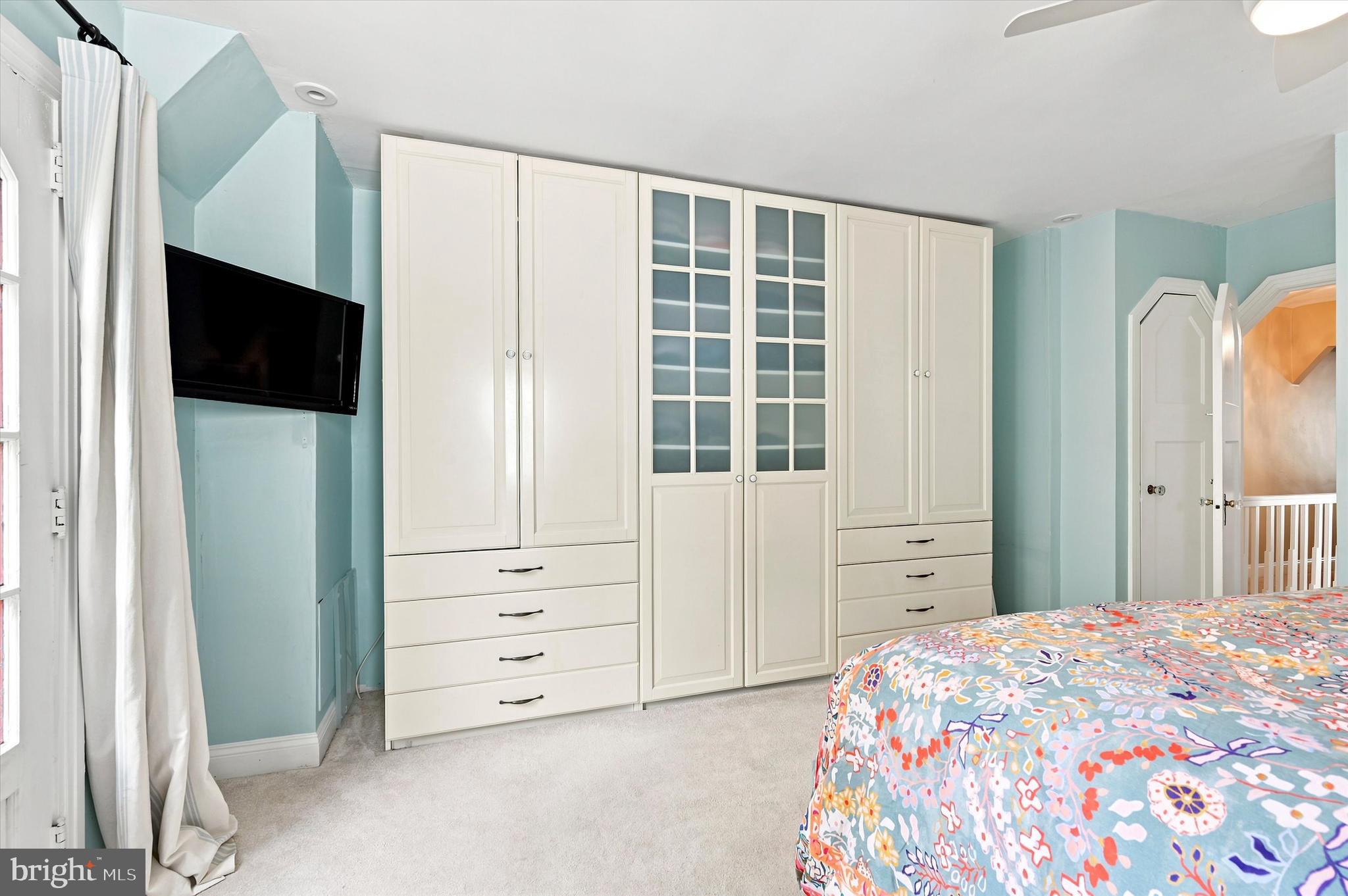 1468 Hampstead Road Wynnewood, PA 19096 - Photo 19 of 29 a bedroom with a bed and a window