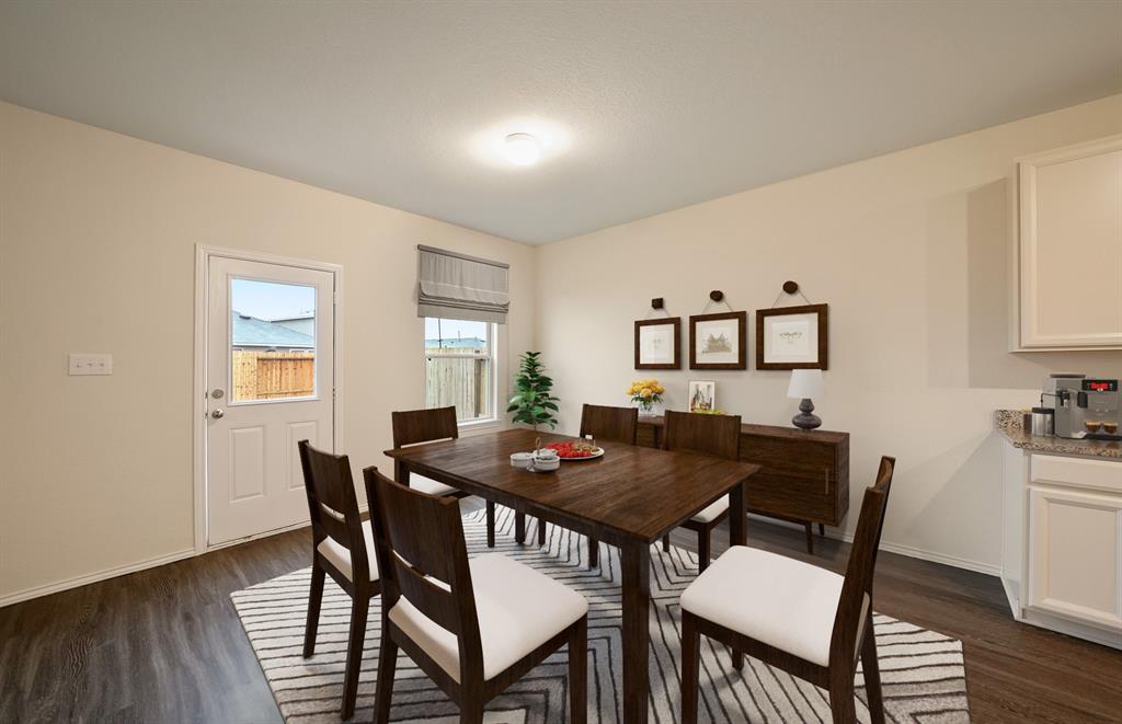2106 Sugar Maple Lane Forney, TX 75126 - Photo 3 of 12 *Model Representation - Dining area off kitchen with large windows