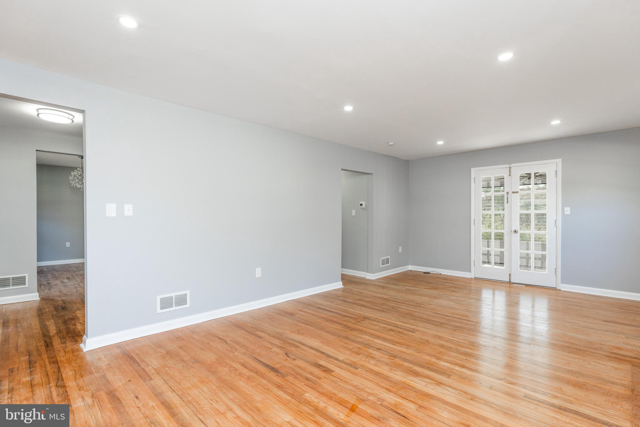 2404 2404-rambler Rambler Road Wilmington, DE 19810 - Photo 11 of 28 a view of an empty room with wooden floor and a window