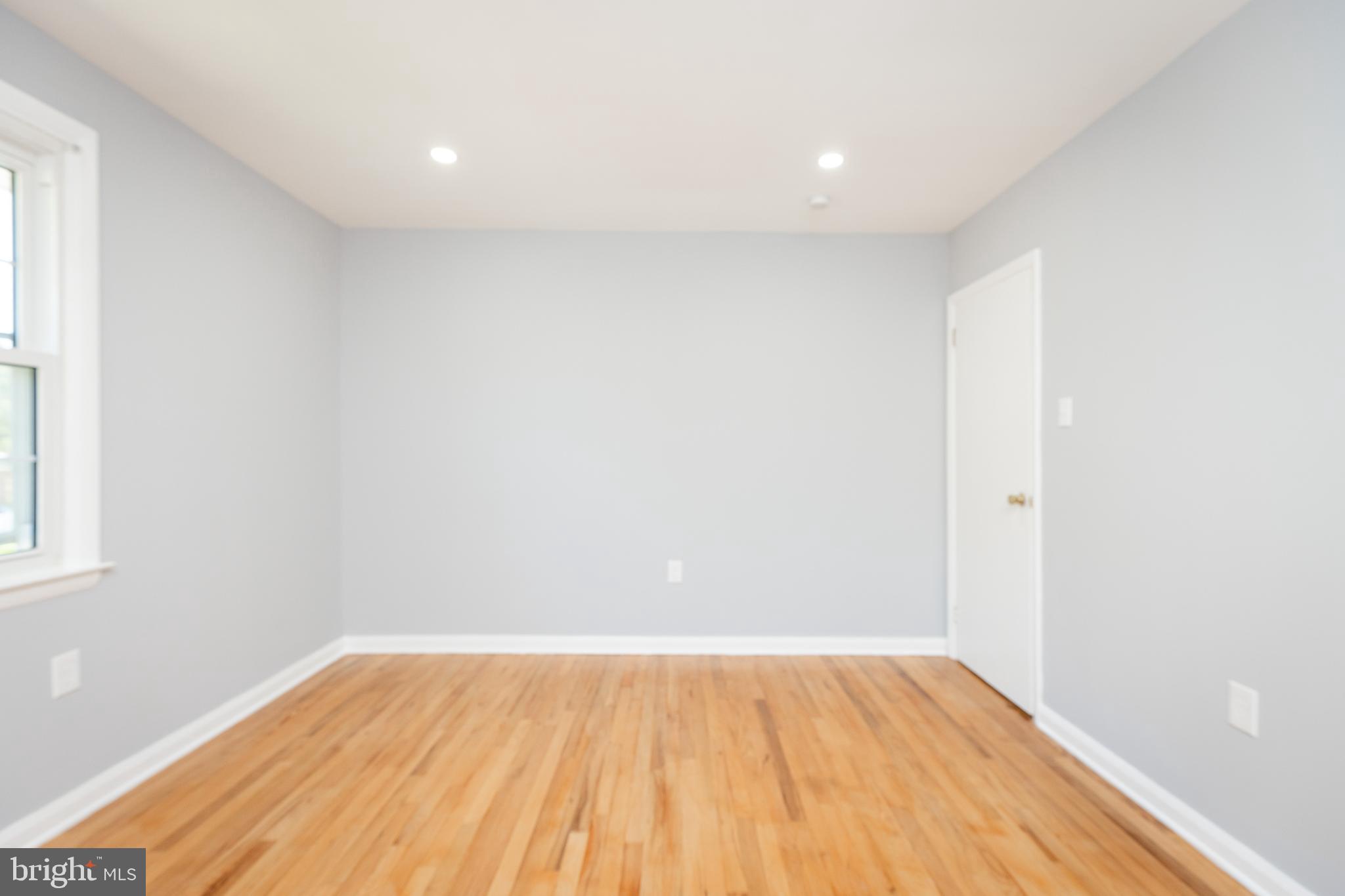 2404 2404-rambler Rambler Road Wilmington, DE 19810 - Photo 18 of 28 a view of empty room with wooden floor